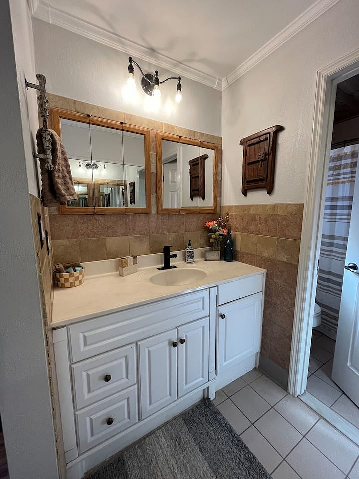 Apt A master bathroom with tub/shower combo
