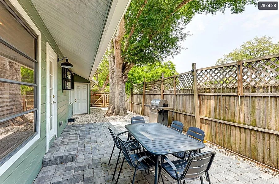 Side patio with grill (pictured) and smoker (not pictured) 