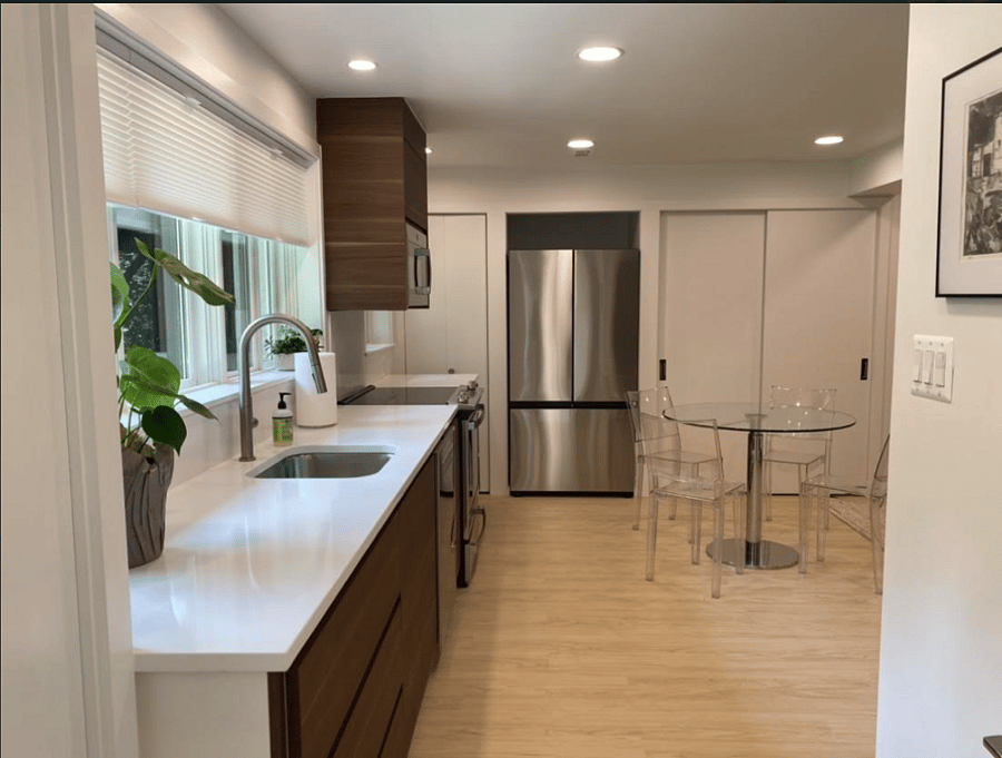 Kitchen with All New Full Size Appliances and Dining Area (Seating for 6) with Large Floor to Ceiling Pantry. Appliances include Bosch D/W, Samsung Fridge, and GE Stove & Microwave.