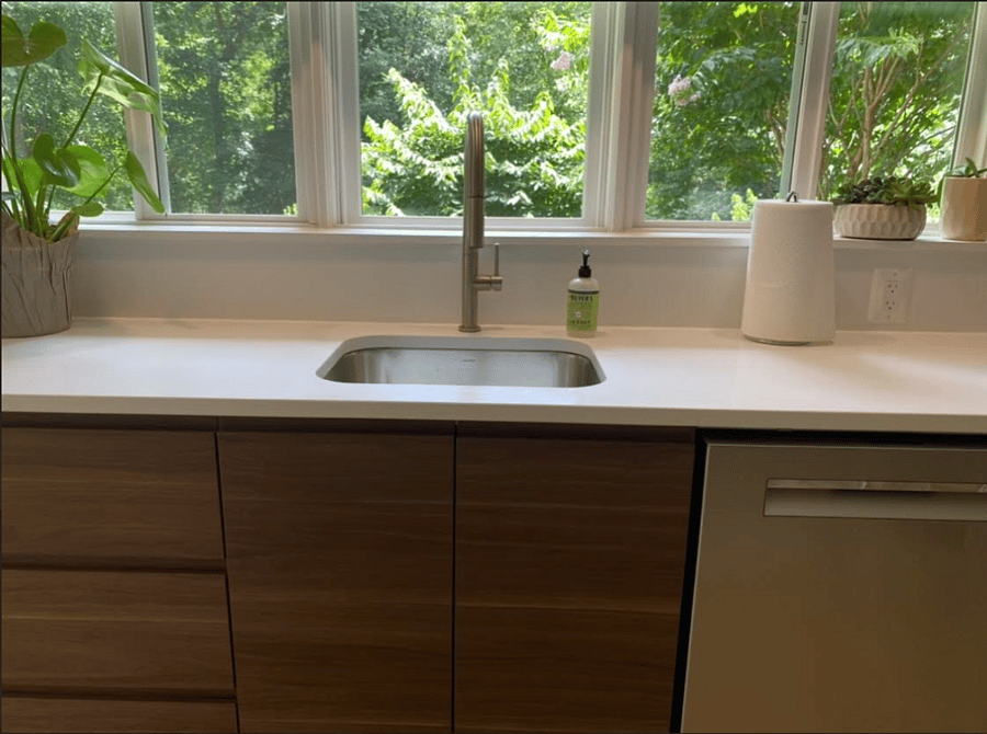 Kitchen Windows Outfitted with Custom Top Down/Bottom Up Shades, Overlooking Garden.