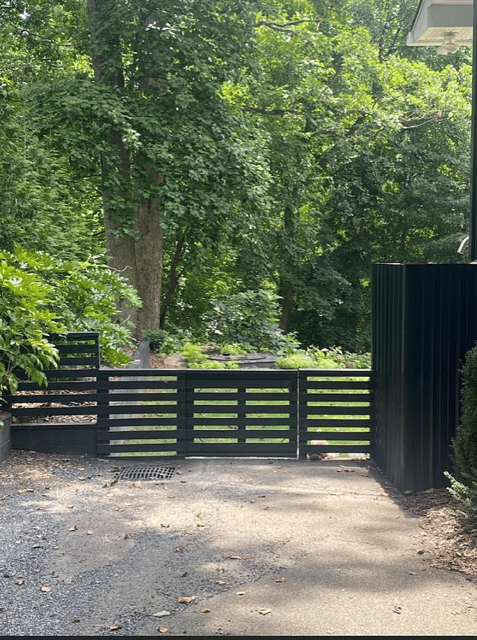 Driveway and Fenced In Garden Leading to Private Entrance.