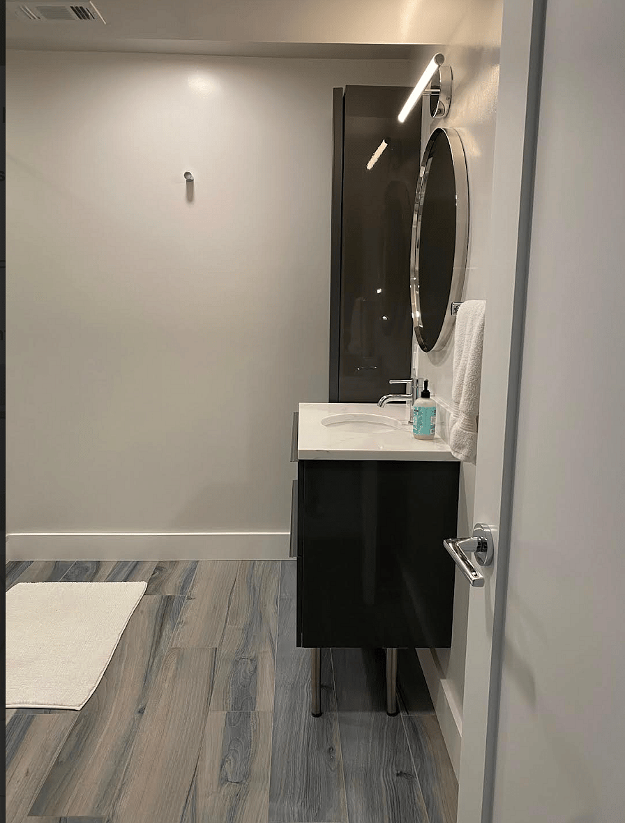 Entrance to Private Studio Full Bath with Custom Ceramic Flooring .