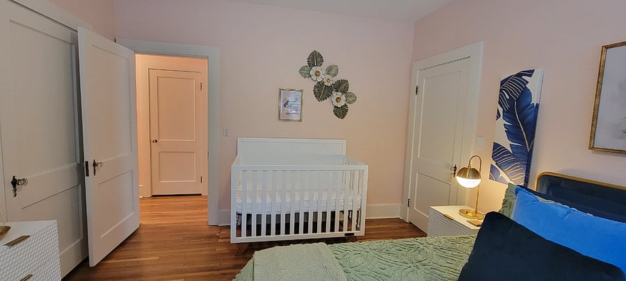 Crib in main bedroom