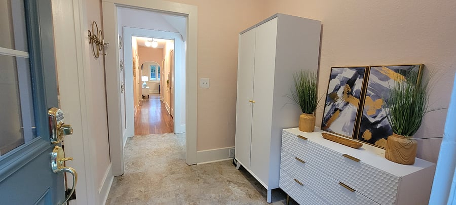 Back entry with outdoor games and hot tub towels