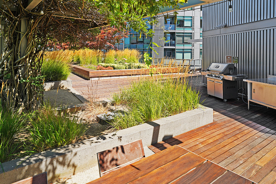 Rooftop BBQ Terrace Grilling area with garden landscaping.