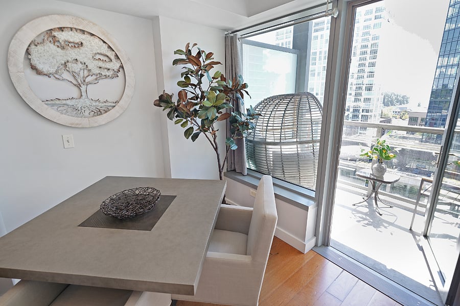 Dining with Balcony Access Indoor-outdoor flow with seating.