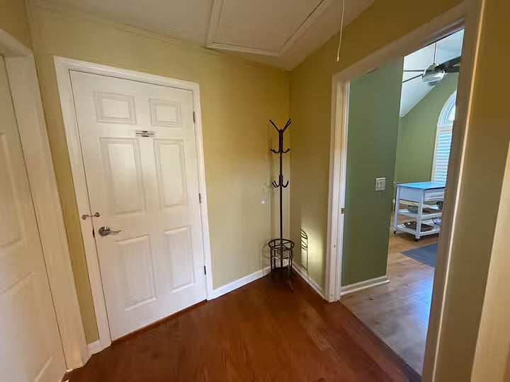 Interior wall with door and lock that separates from owner's space