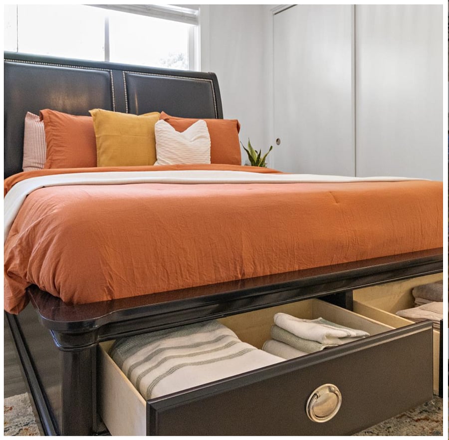 Convenient storage built into the master bed is perfect for keeping essentials close.