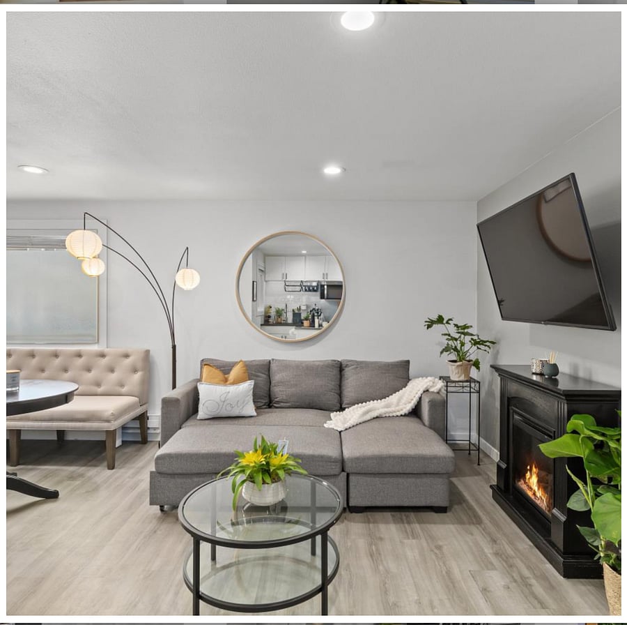 A third full-sized bed or cozy lounge sofa adds extra space for indoor relaxation.