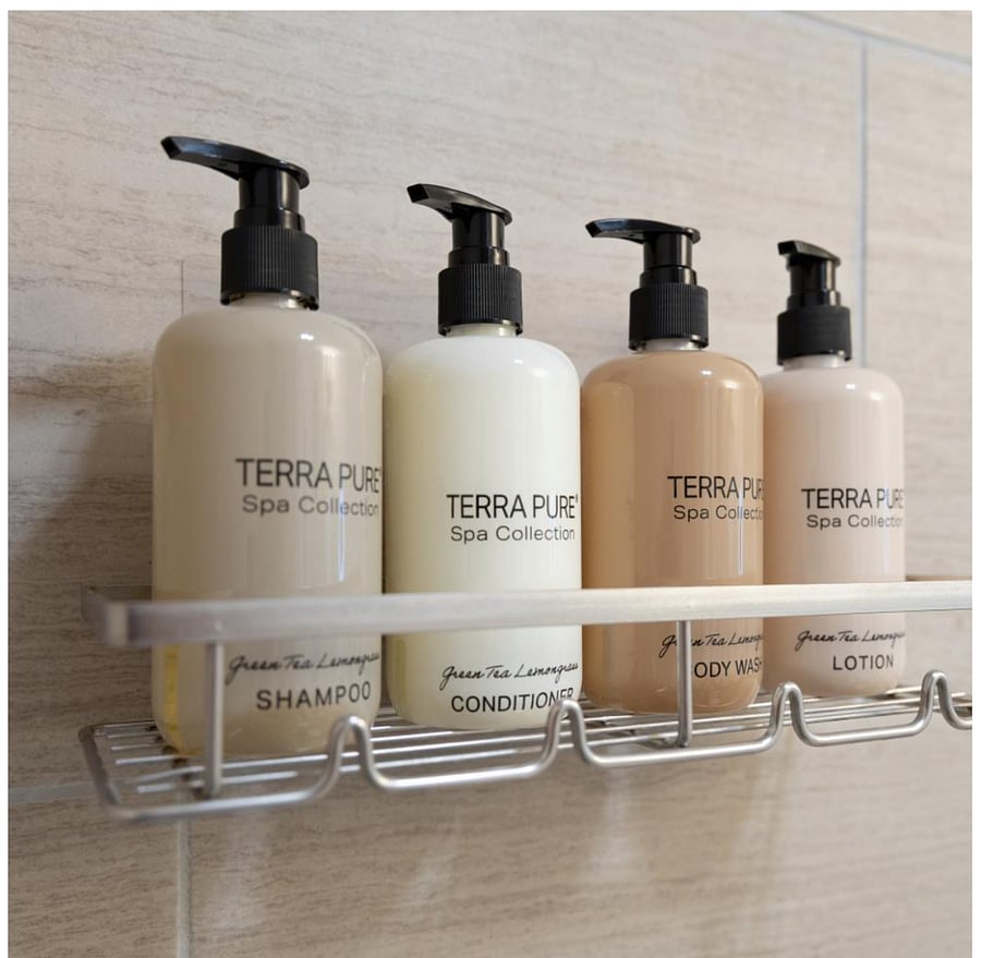 Enjoy the Terra Pure Infuse starter kit with White Tea & Coconut shampoo, conditioner, body wash, and lotion.