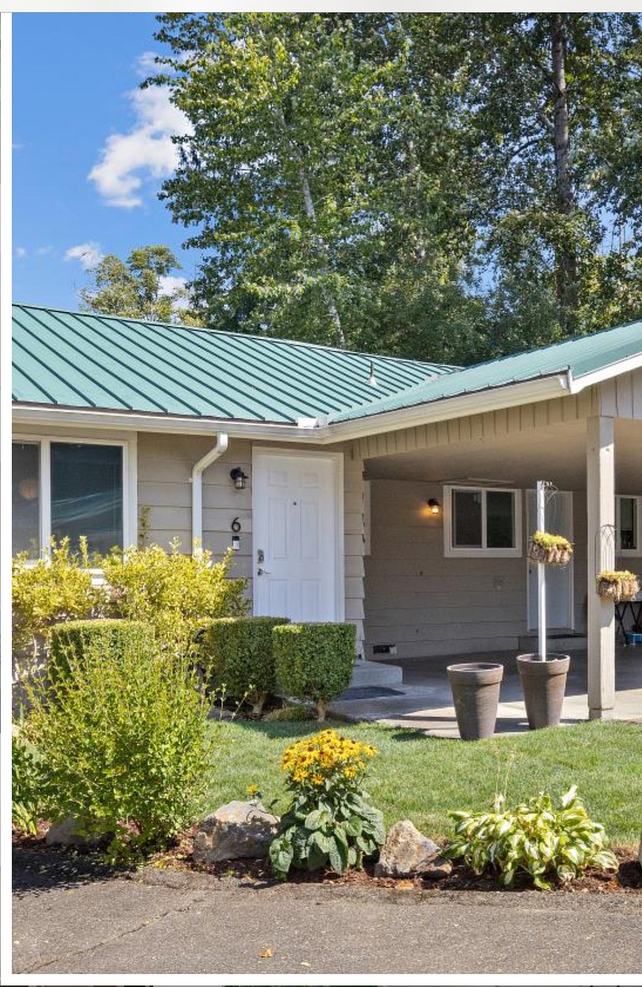 The white door on the right leads to the laundry room.