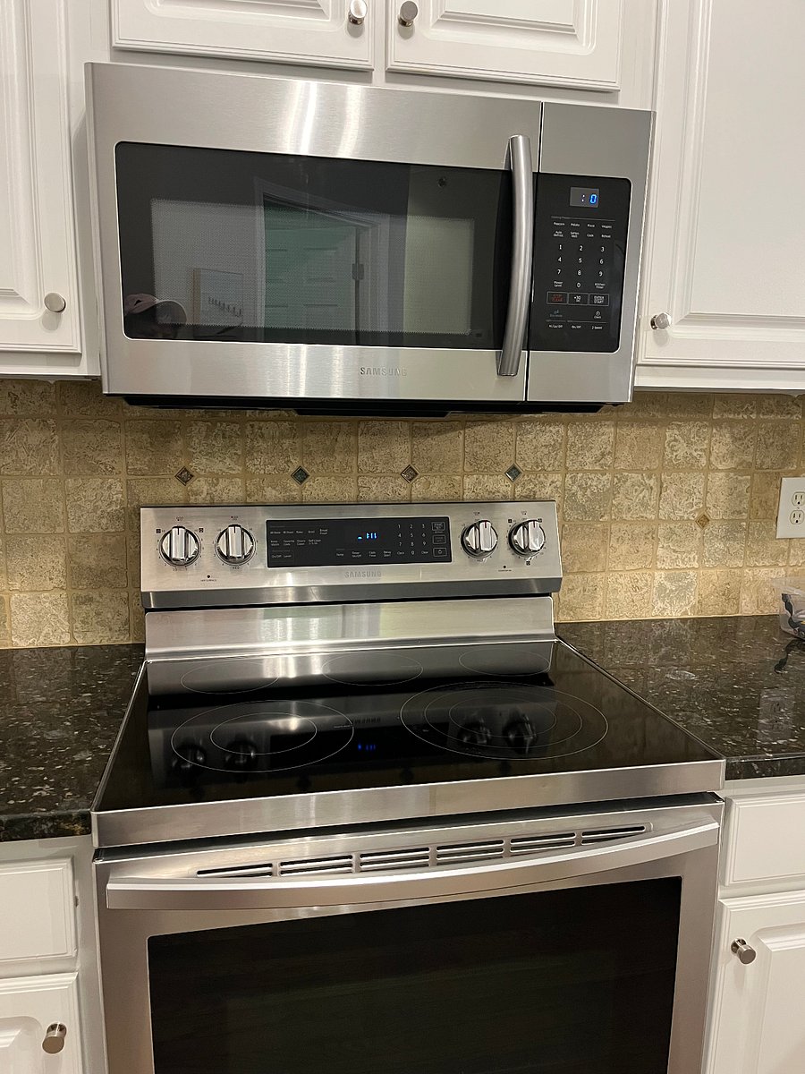 stainless stove, cooktop and microwave ... and ultra-quiet dishwasher.
