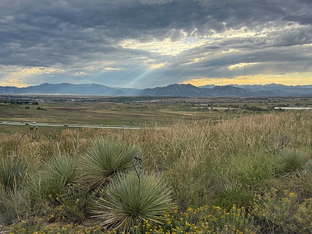 View as you walk the trail. Storm over Boulder!