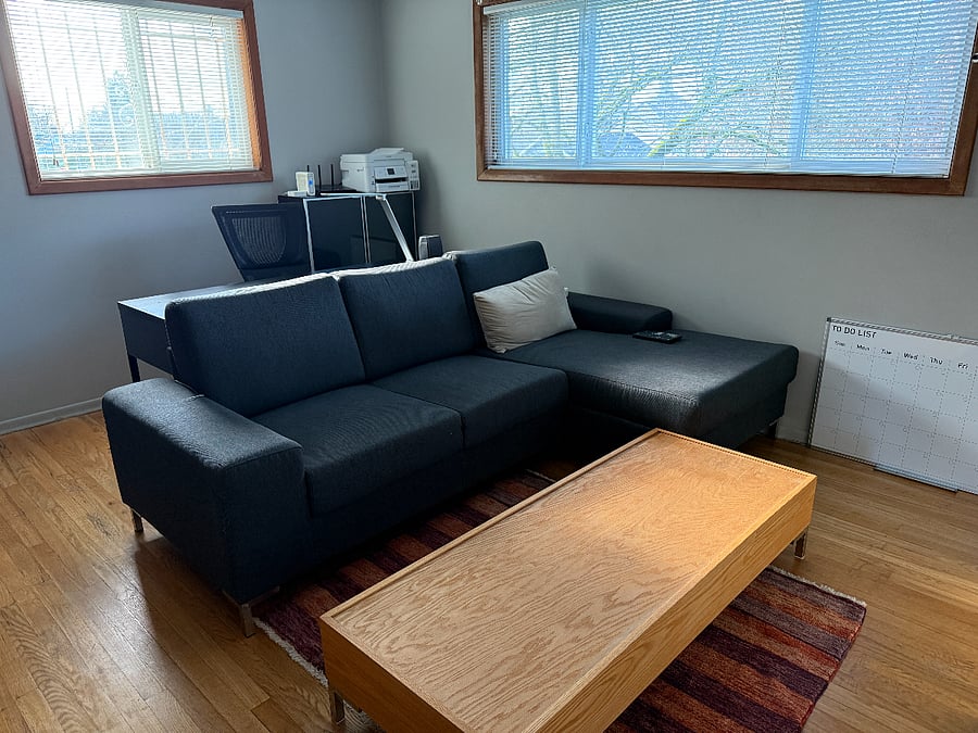 sectional and coffee table designed to create another queen size guest bed