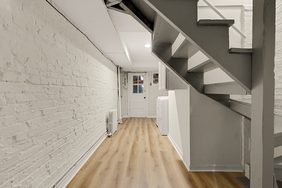 External property entrance and shared washer/dryer