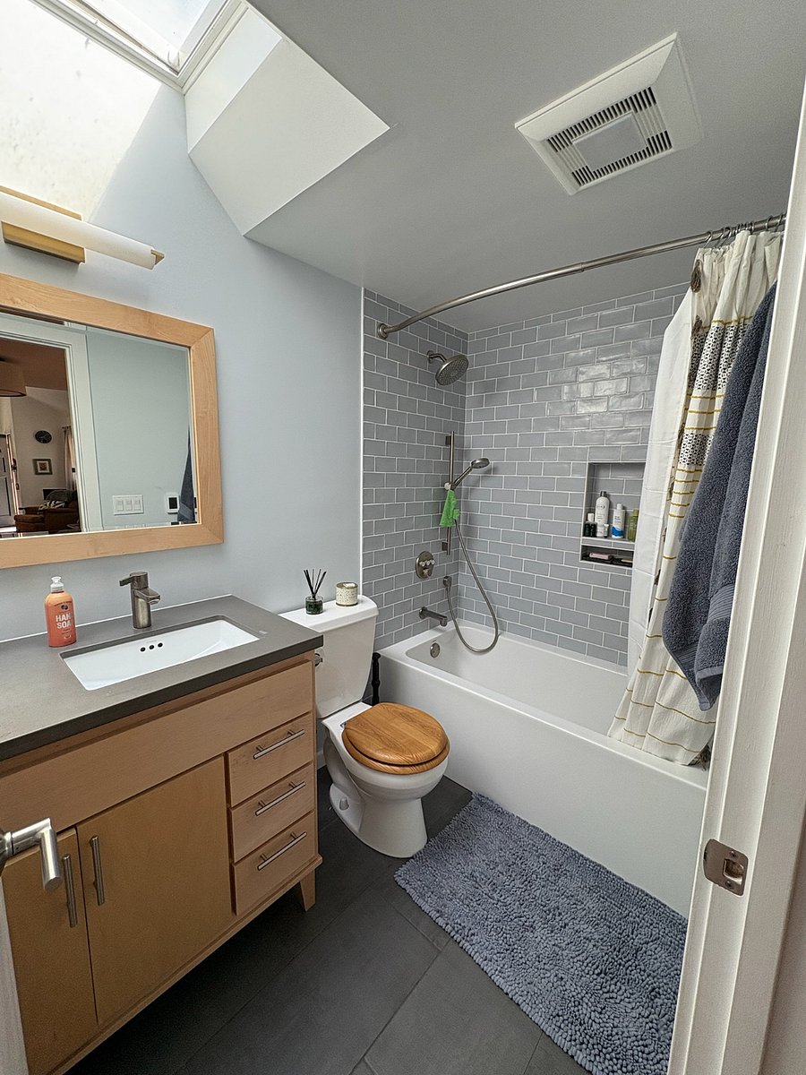 Bathroom 1 with bath and heated floor.
