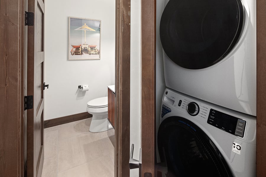 Stack washer and dryer and 1/2 bath