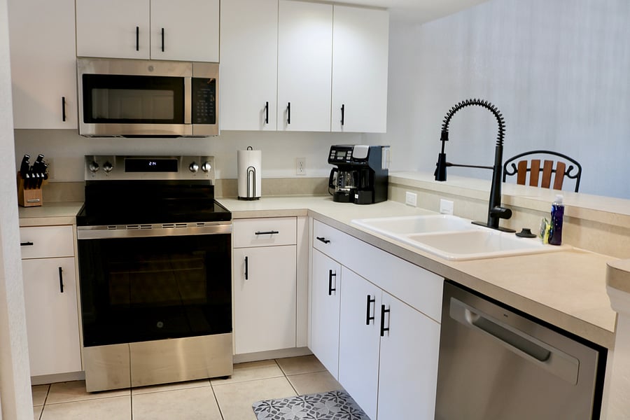 Full Kitchen- 12 Cup and Single Brew Coffee Options, Crockpot, Blender, Toaster, Pots, Pans, Utensils, Plates and Cups.
