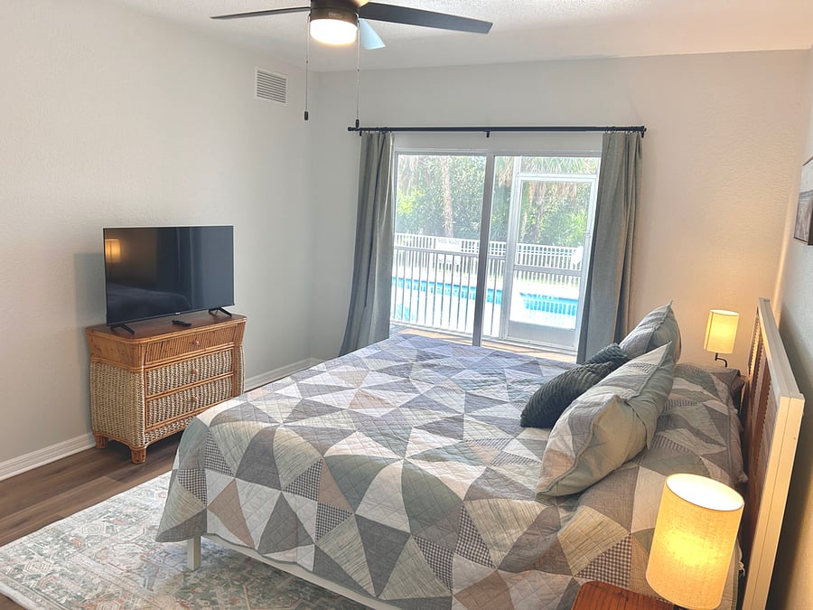King Bedroom 1 with access to outdoor patio