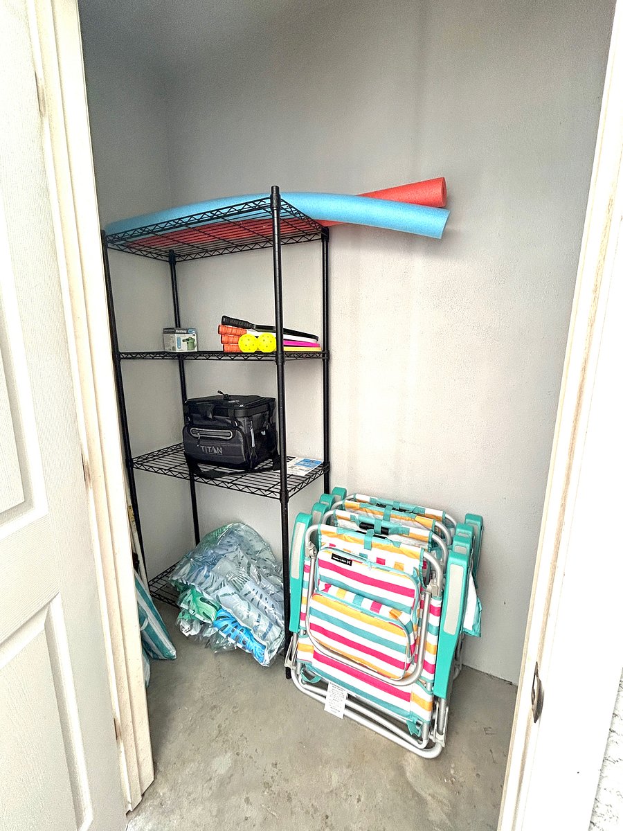 Outdoor Storage with Beach Chairs, Cooler, Pool Noodles, Pickle Ball Set