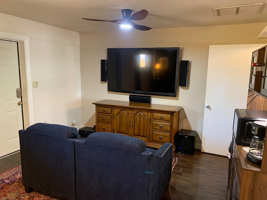 TV with Fire Stick and surround sound.