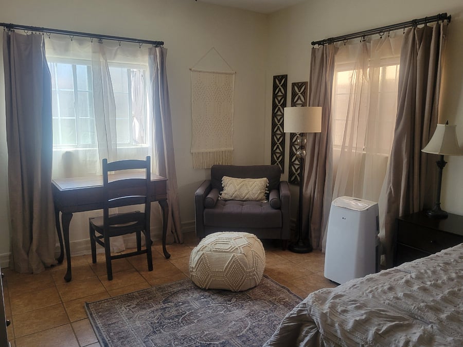 Bedroom with portable A/C unit (portable heater also available)