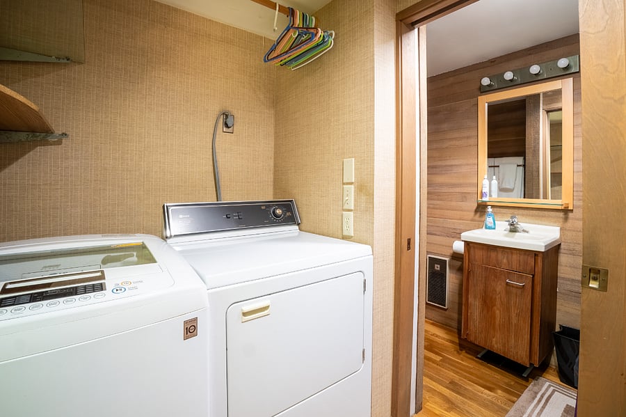 Full size washer and dryer and 3/4 bath with stand up shower