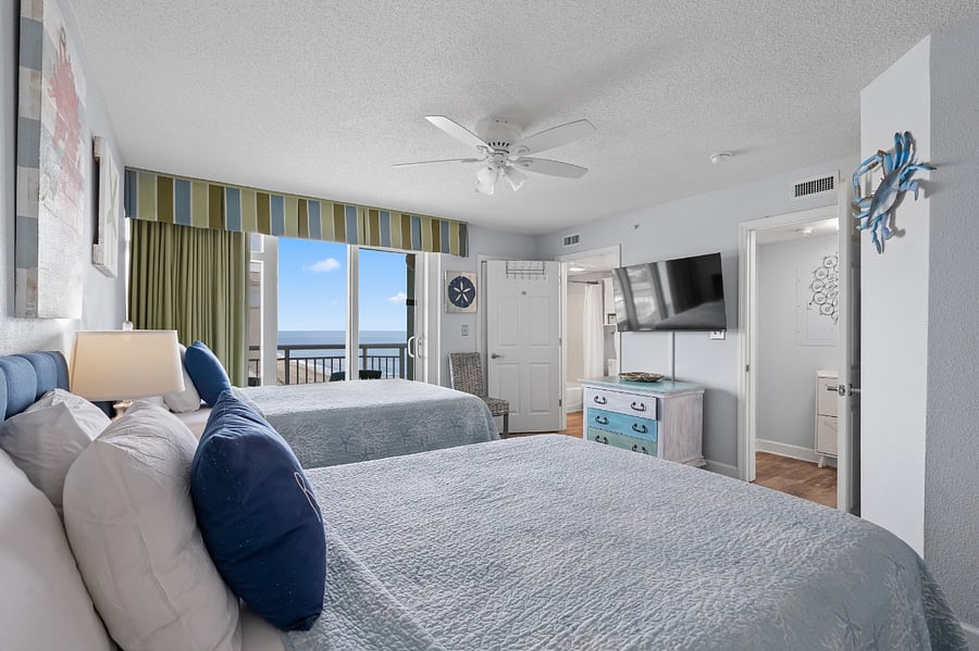 2nd bedroom with smart TV and private ocean view balcony