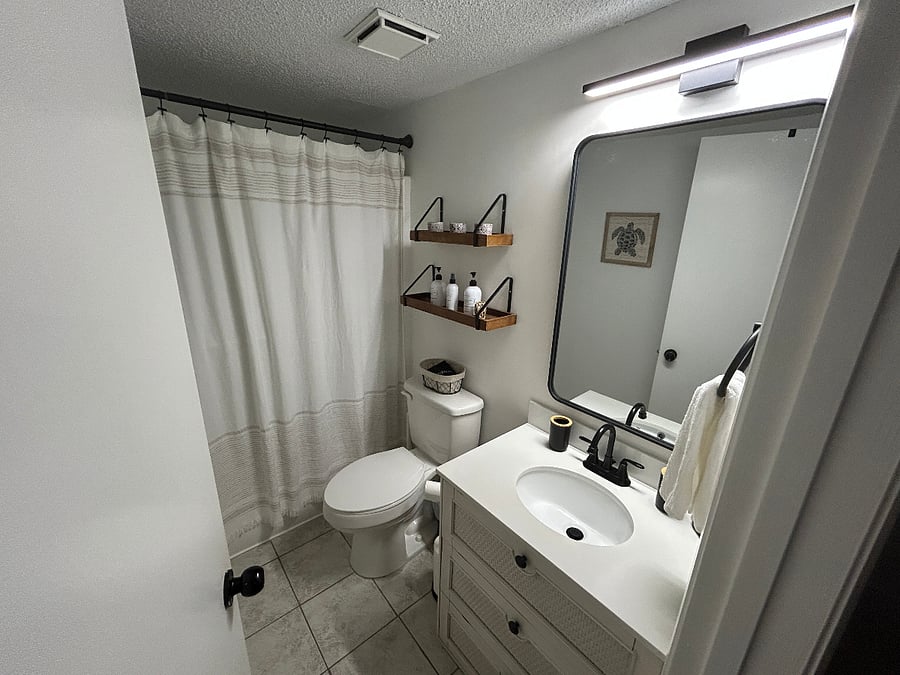 Bathroom 2 is a full-bath tub and shower combination. 