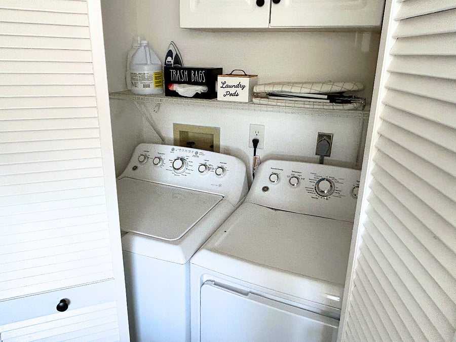 Full-sized washer and dryer located inside the condo unit. 