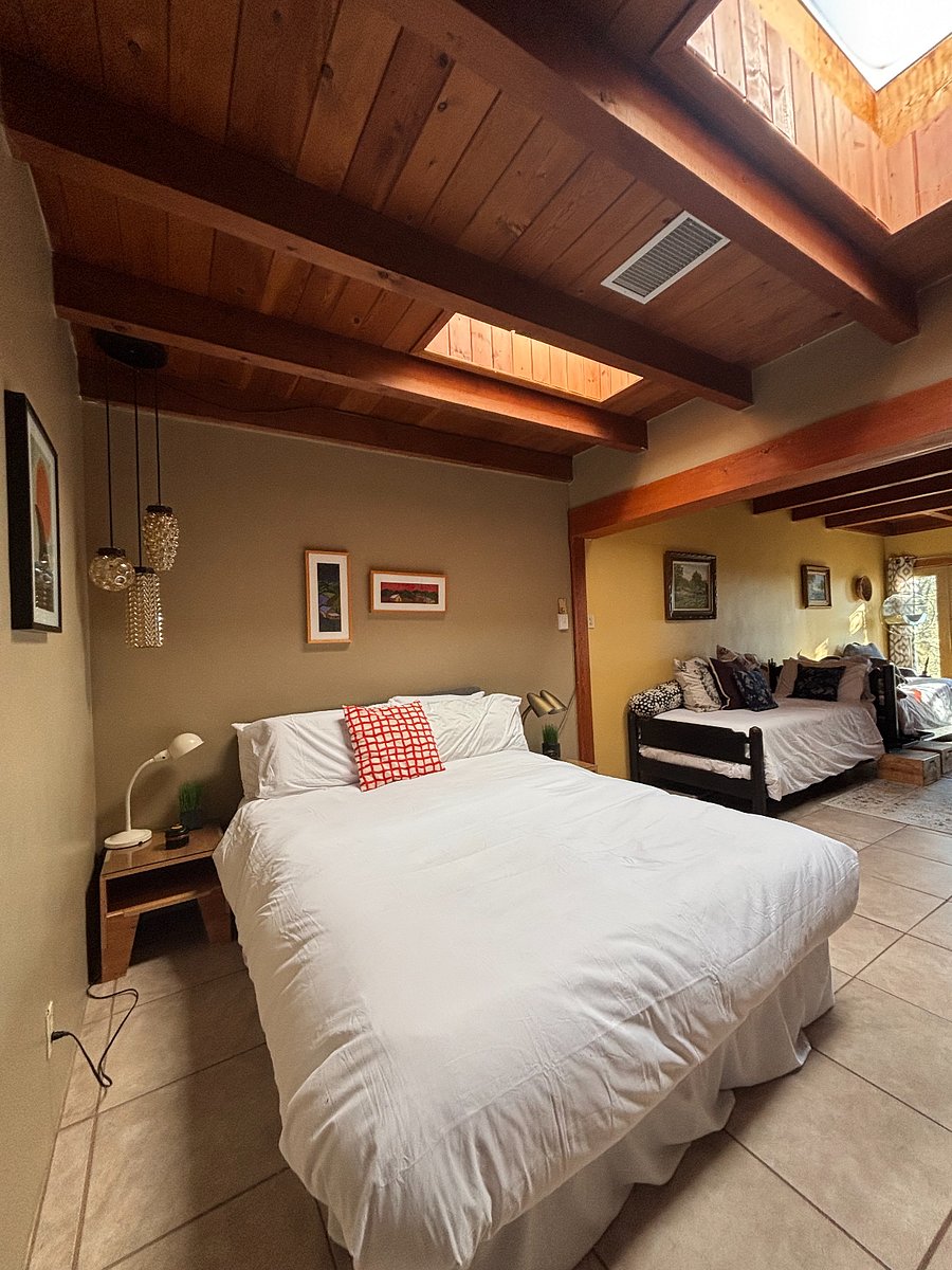 Queen bedroom with double twins adjacent, library