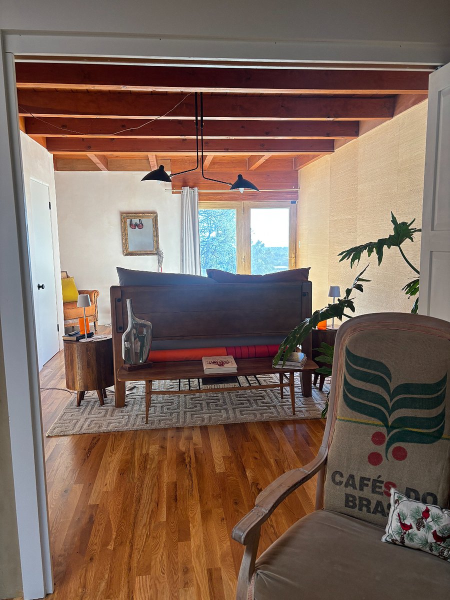 primary suite with half bath and walk in closet