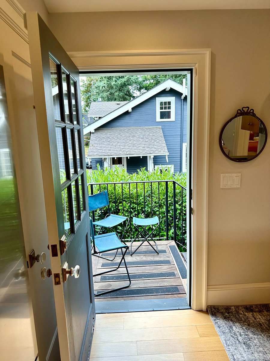 Private stairs lead to small sitting deck in-front of separate entrance.