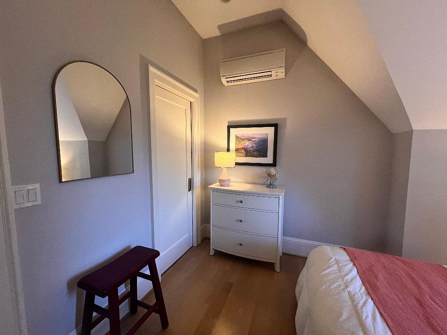 Bedroom includes mirror and closet