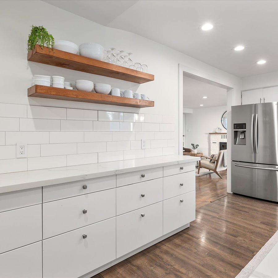 The kitchens thoughtful layout and extra counter space make it a breeze to whip up family meals or host a small gathering.