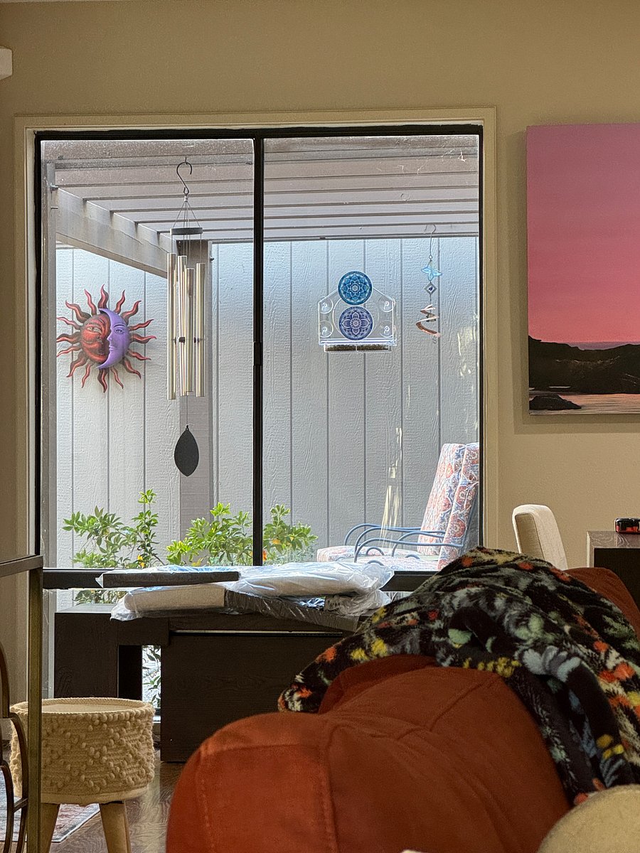Big window between dining and Den office