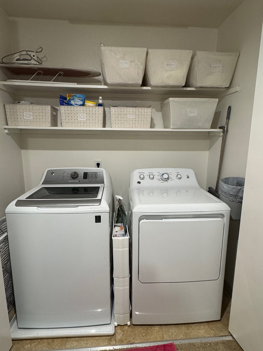 Laundry upstairs between bedroom and bathroom