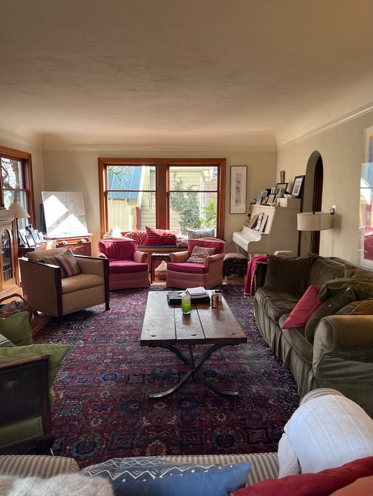 Spacious living room with fireplace available for communal use