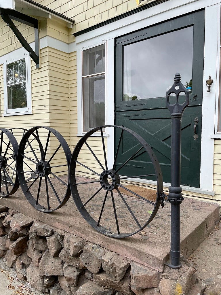 Historic Charm: Once owned by Ted Robertson, publisher of the Yakima Daily Republic and Yakima Morning Herald, this home features unique details like wagon wheels from Yakimas original town hearse on the side porch, a giant original Dutch door and a rockery designed by famed architect John W. Maloney.