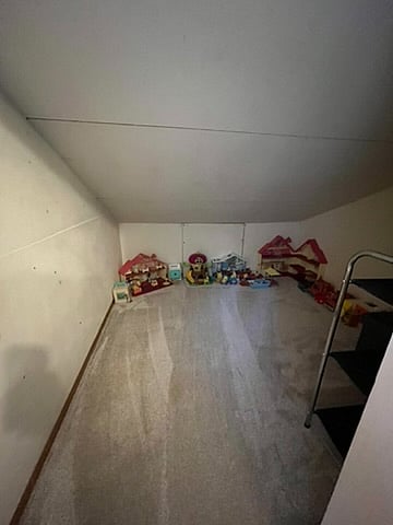 2nd floor bedroom additional storage or playspace.