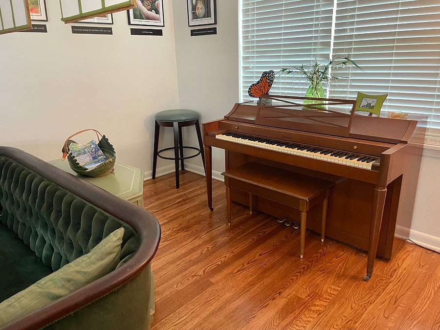 Living room. Piano is tuned.