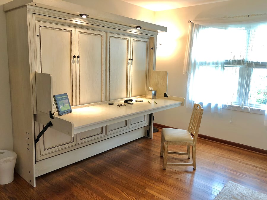 White bedroom. Bed converts to desk.
