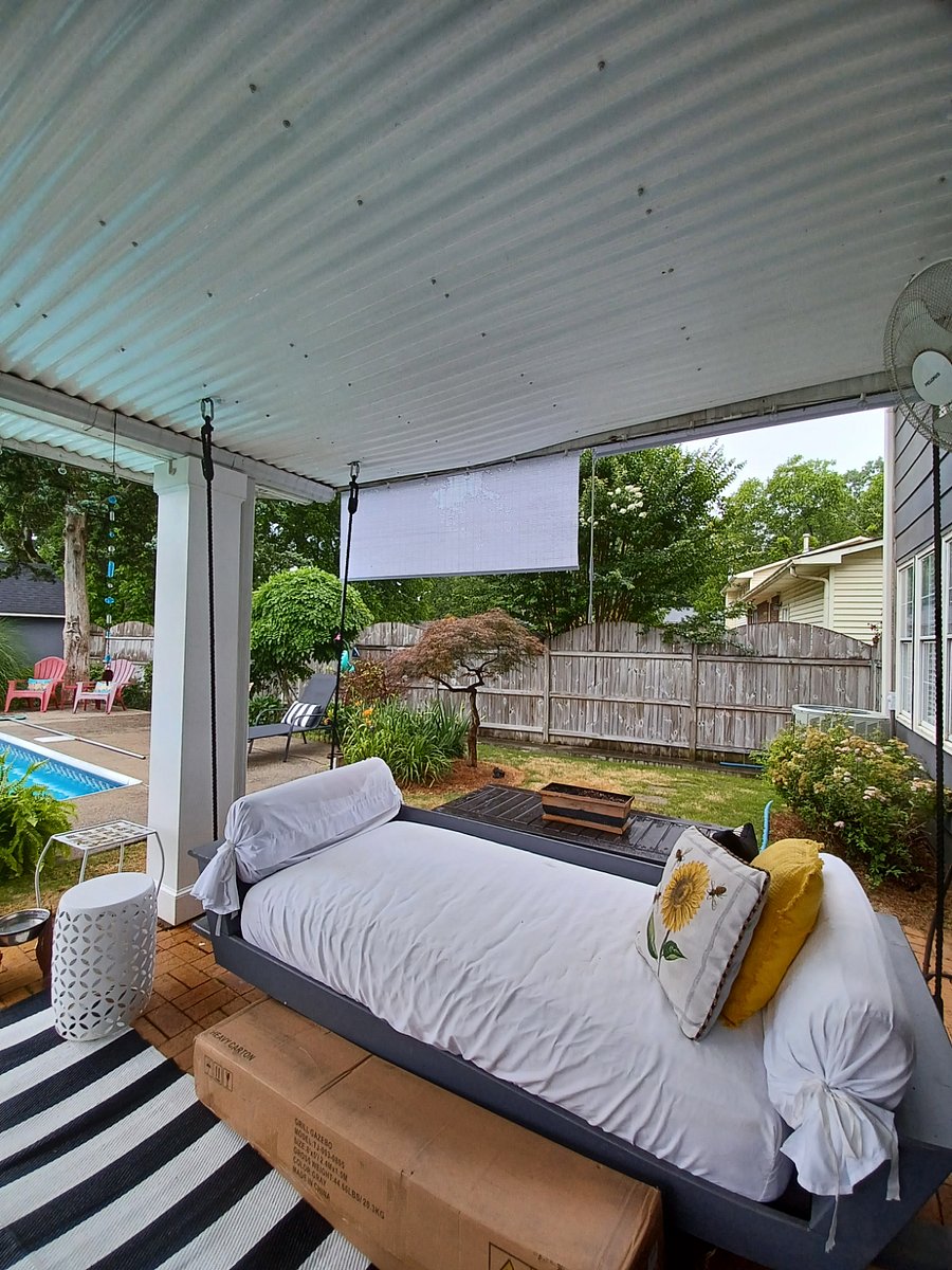 Day swing w pool view, outdoor TV, drop down Privacy screens and oscillating fans.