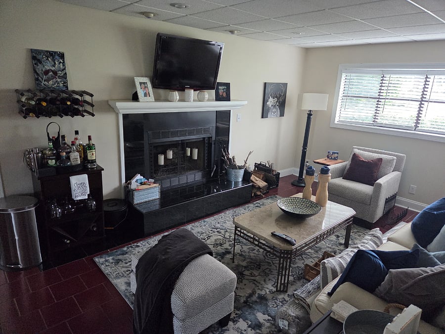 Additional lounging space w/ mounted flat screen above fireplace