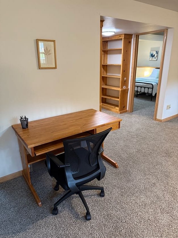 downstairs office space with desk