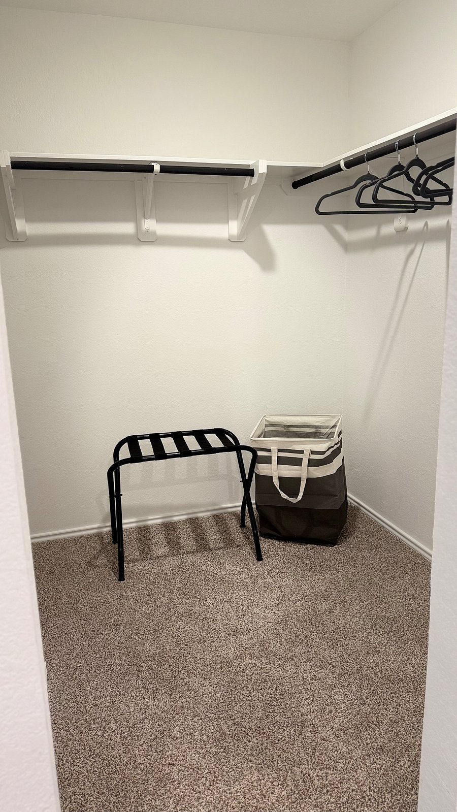 Spacious walk-in closet in the master bedroom