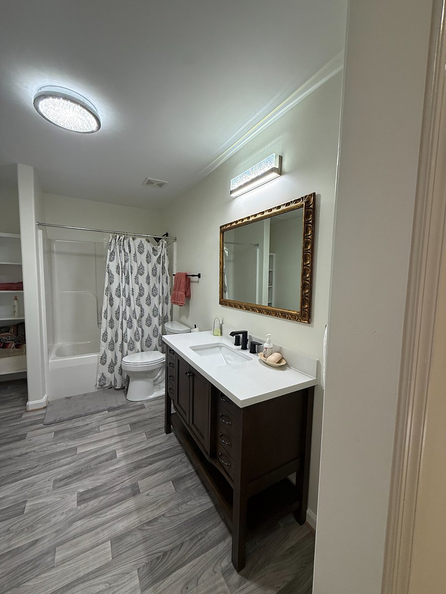 Large private bathroom with additional storage
