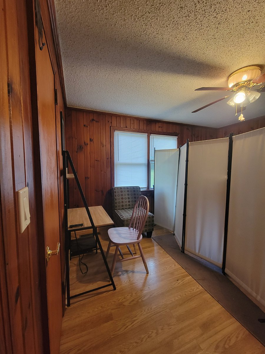 Dedicated study area in partitioned room.My art studio is on the other side of the movable partitioned wall.