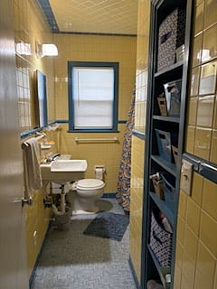 Fun and funky main bathroom has fabulous 50s charm. 