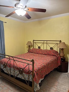 Main bedroom has queen bed, nightstands, lamp, dresser, chairs and closet.